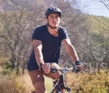 files/imgi_1_focused_202429744-stock-photo-young-man-mountain-biking-sunny.jpg